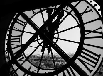A black and white photo of a clock.