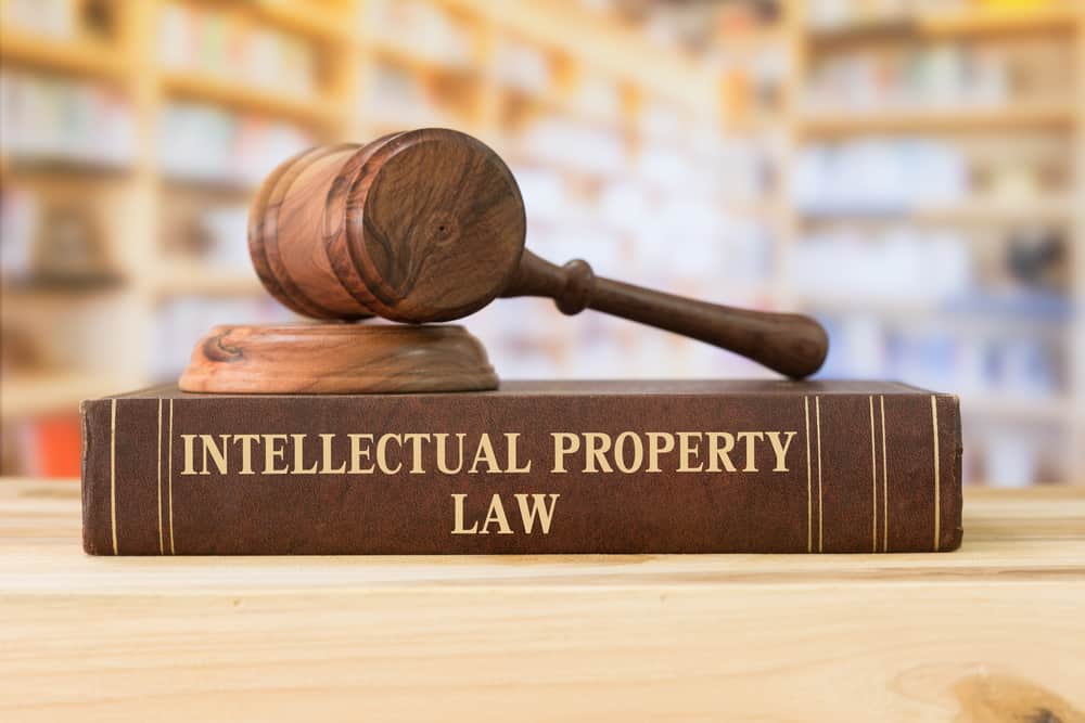 gavel sitting on a book titled intellectual property law.